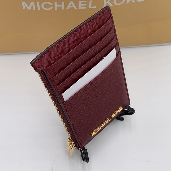 Michael Kors Jet Set Travel Medium Top Zip Card
Case Wallet
Dark Sherry color - Picture 8 of 11